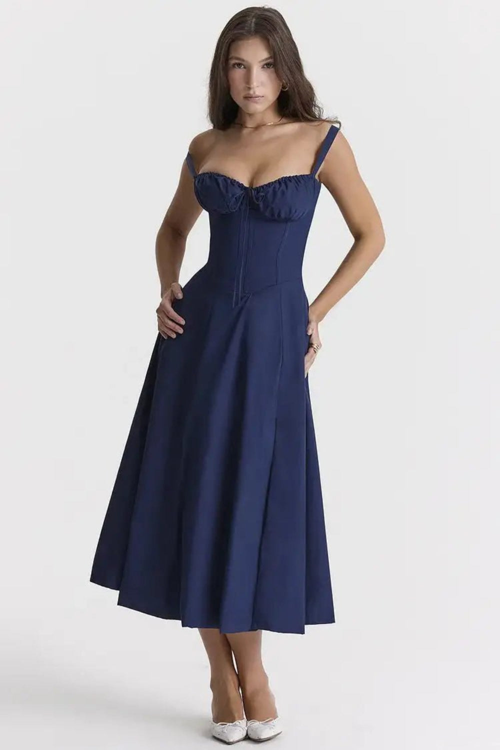 Elegant vintage pleated dress offering a timeless, sophisticated look.